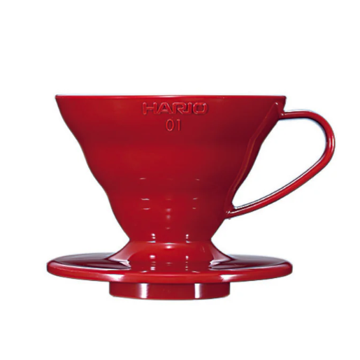 Red Hario coffee dripper on a white background